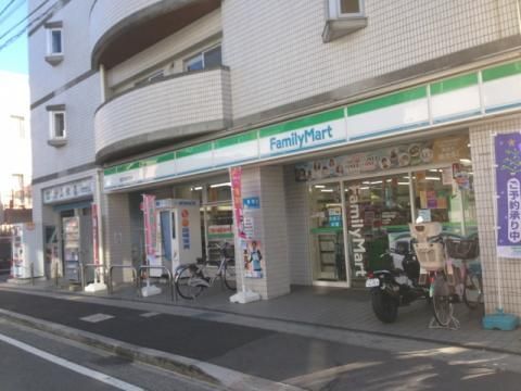 ファミリーマート稲田堤駅前店の画像