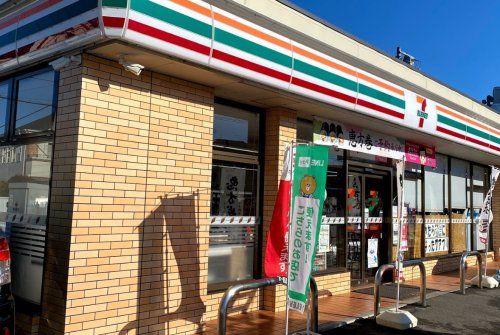 セブン-イレブン 日野高幡橋南店の画像