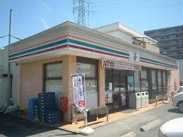 セブンイレブン 草加花栗北店の画像