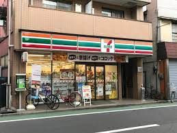 セブンイレブン 中野新井薬師前駅北店の画像