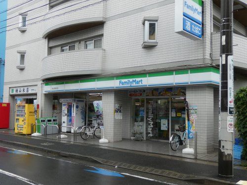 ファミリーマート稲田堤駅前店の画像