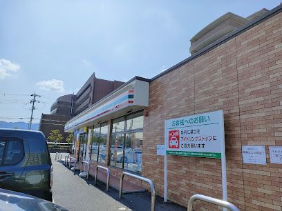 セブンイレブン 四條畷中野店の画像